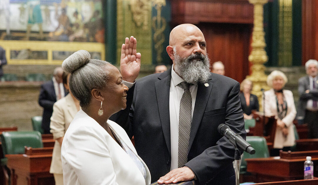 Senator James Malone is sworn in alongside his fiancée, Beverly.